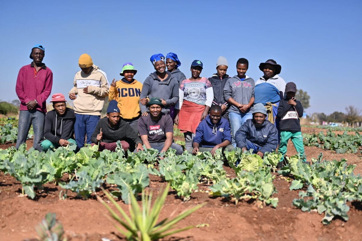 Some of the Believers Youth Program members at their garden in Meriting