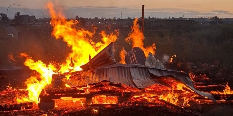 Up in smoke, residents watch helplessly as flames consume a home (Image: Supplied)