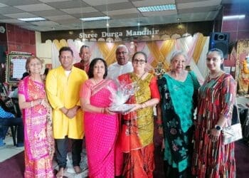 Devotees and executive members of the Shree Durga Mandir gather in celebration during the 12th Annual 108 Durga Chalisa Recitals (Image: Kamlesh Ghurbarun)