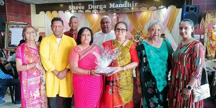 Devotees and executive members of the Shree Durga Mandir gather in celebration during the 12th Annual 108 Durga Chalisa Recitals (Image: Kamlesh Ghurbarun)