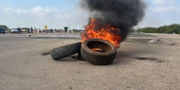 Burning tyres at the Golden Highway and Wimbledon road corner (Image: Viki Stuurman)