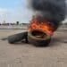 Burning tyres at the Golden Highway and Wimbledon road corner (Image: Viki Stuurman)