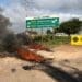 Burning tyres at the Golden Highway as Phum’lamqashi residents strike for access to water ( Image: Viki Stuurman)