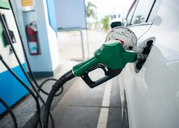 A fuel nozzle pumps petrol into a vehicle at a filling station, as motorists brace for another price hike set to take effect on Wednesday (Image: News24)