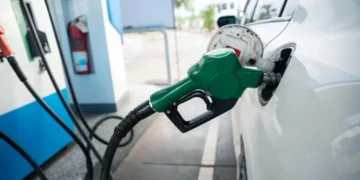 A fuel nozzle pumps petrol into a vehicle at a filling station, as motorists brace for another price hike set to take effect on Wednesday (Image: News24)