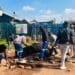 TILBIT Construction workers block the entrance to the construction site (Image: Viki Stuurman)