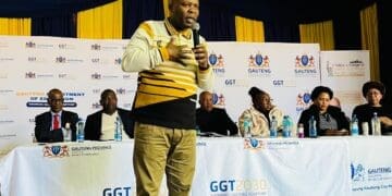 Gauteng MEC for Education, Sport, Arts, Culture and Recreation, Lebogang Maile, addresses residents in Ennerdale during the “It Takes a Village to Raise a Child” campaign (Image: Viki Stuurman)
